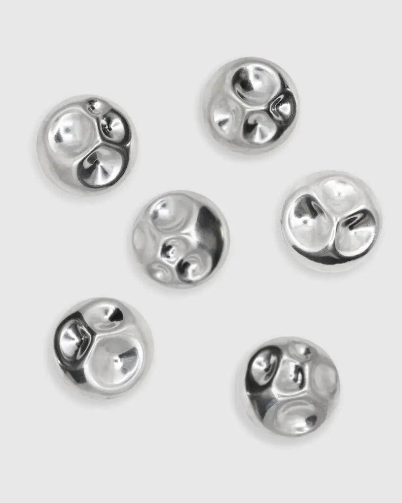 boucles d'oreilles impactite en argent de réemploi